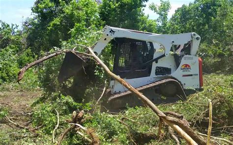 skid steer land clearing instructions